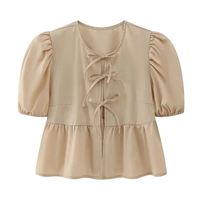 Blouse à manches bouffantes imprimé léopard avec détail nœud