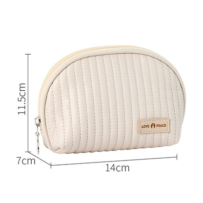 Trousse de maquillage en cuir matelassé