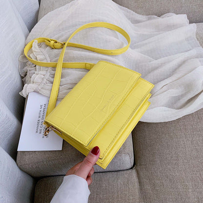 Sac à bandoulière en cuir texturé