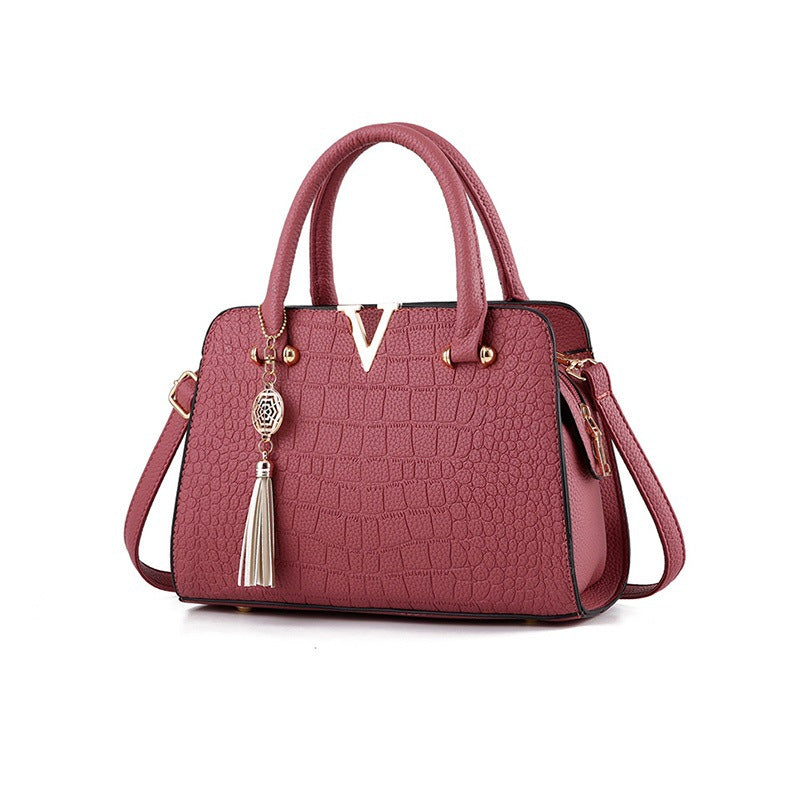 Sac à Main Élégant à Motif Texturé avec Pendentif Décoratif
