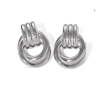 Élodie Lavin® | Boucles d’oreilles anneaux entrelacés en métal poli