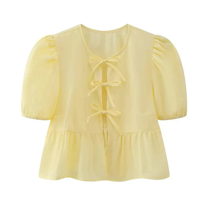 Blouse à manches bouffantes imprimé léopard avec détail nœud