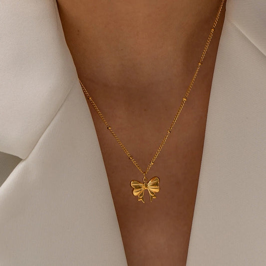 Élodie Lavin® | Collier doré pendentif nœud romantique