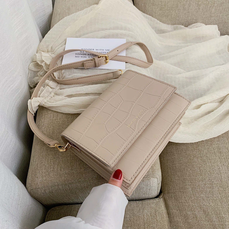 Sac à bandoulière en cuir texturé