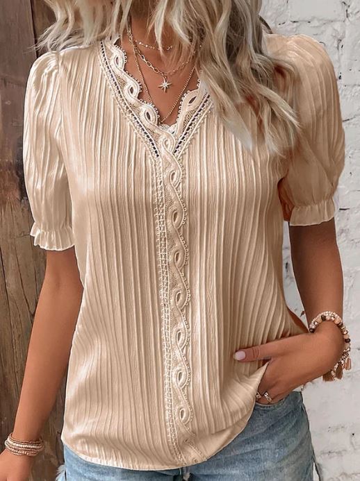 Chemise élégante à col en V avec bords lisses