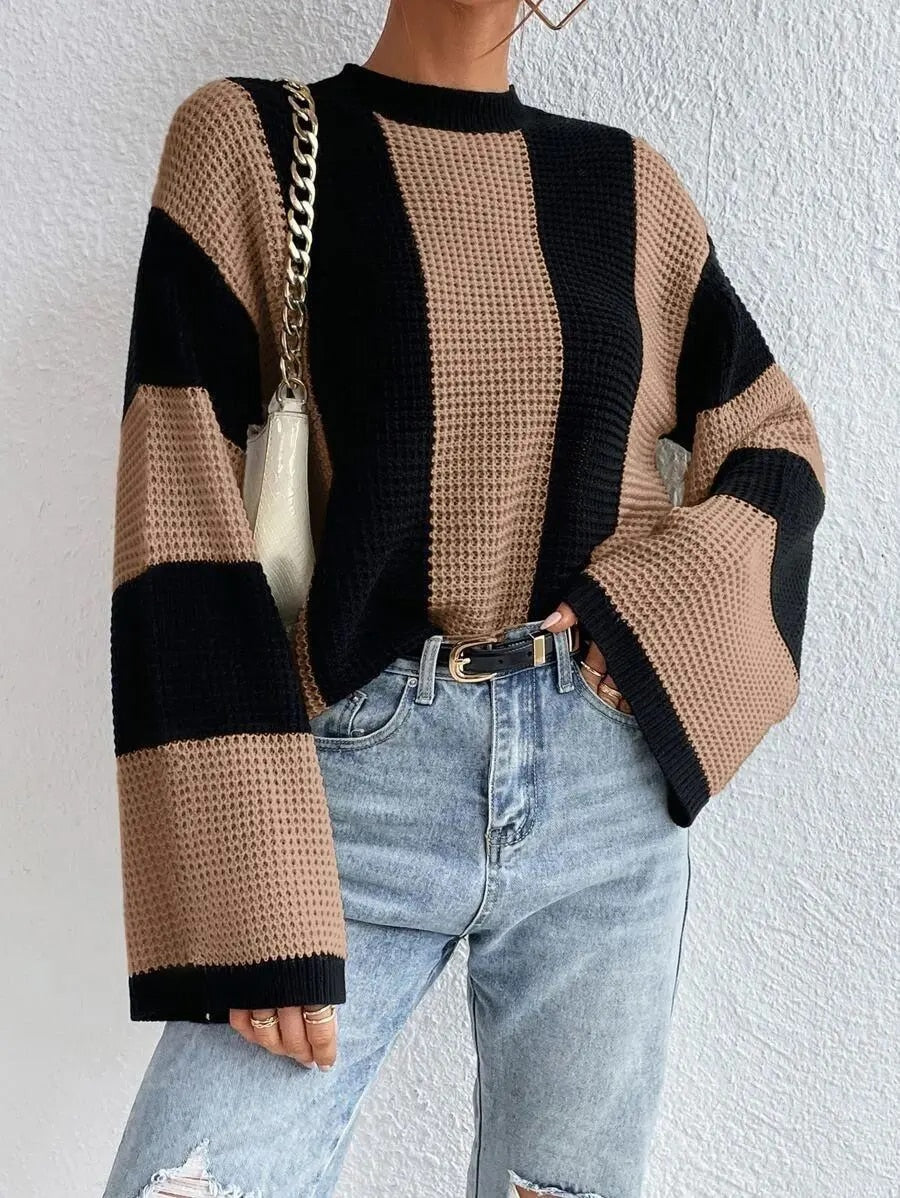 Pull douillet bicolore en maille avec détail aux larges manches