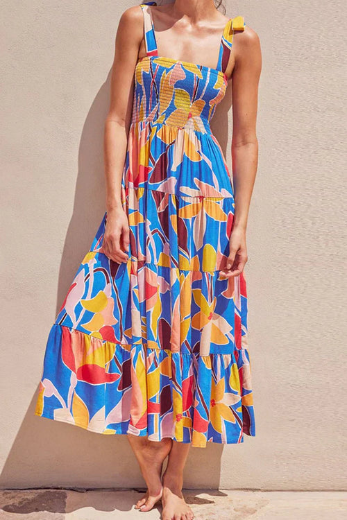 Robe à fleurs avec fermeture sur les épaules et bretelles froncées