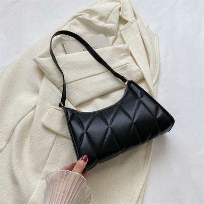 Sac baguette en cuir matelassé