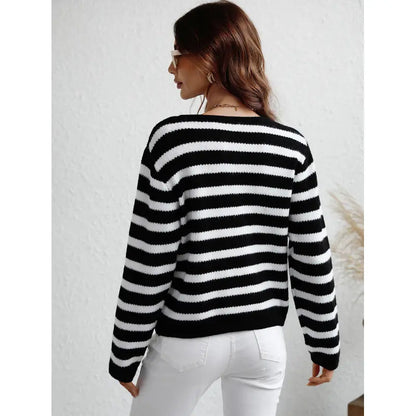 Pull en maille douillet avec fermeture à boutons et poches latérales
