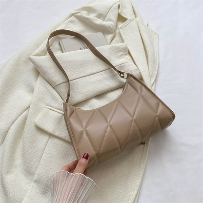 Sac baguette en cuir matelassé