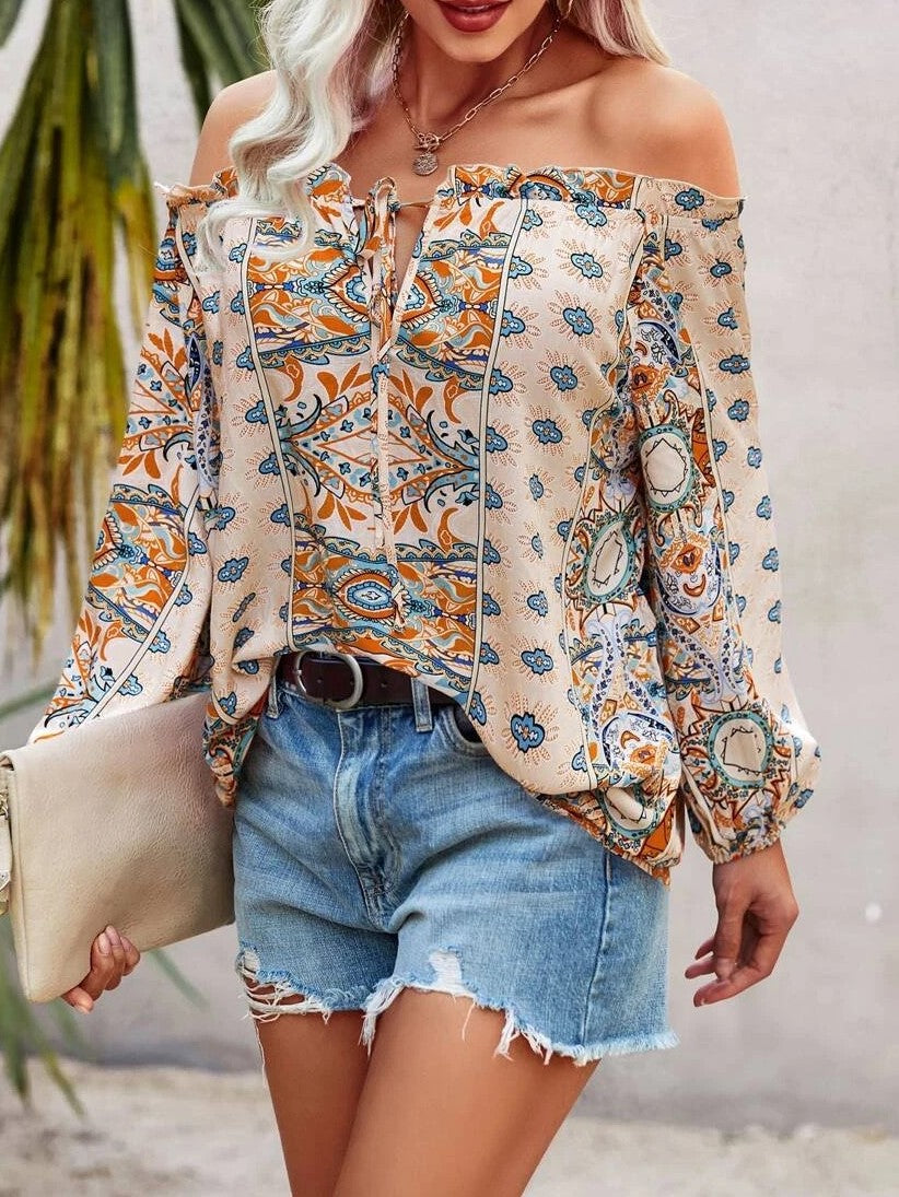 Chemise bohème à fleurs imprimée sur les épaules avec volants