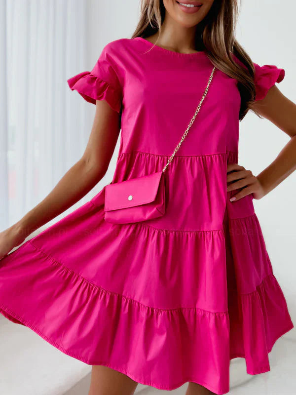 Robe à manches larges, encolure ronde et ourlet irrégulier