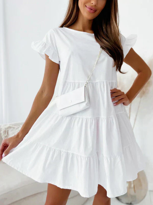 Robe à manches larges, encolure ronde et ourlet irrégulier