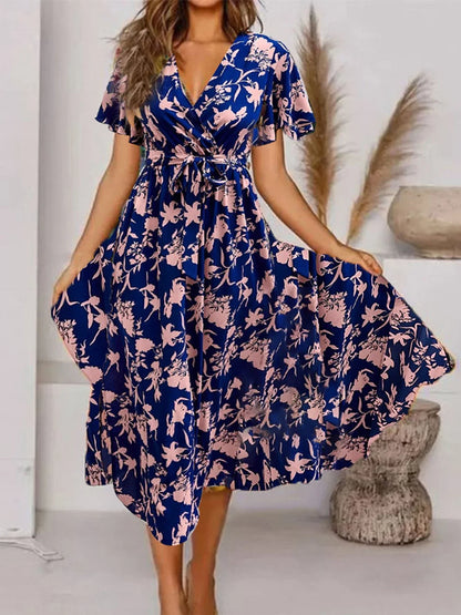 Evy | Élégante robe midi à imprimé floral romantique