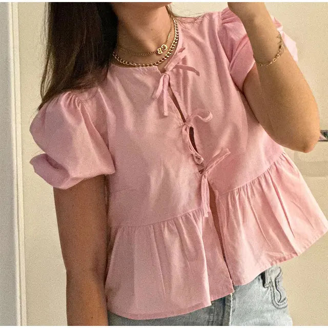 Blouse à manches bouffantes imprimé léopard avec détail nœud