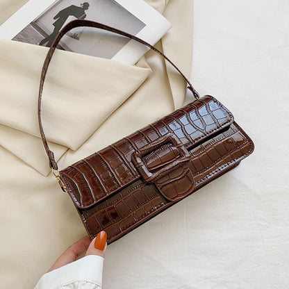 Sac baguette en cuir texturé brillant