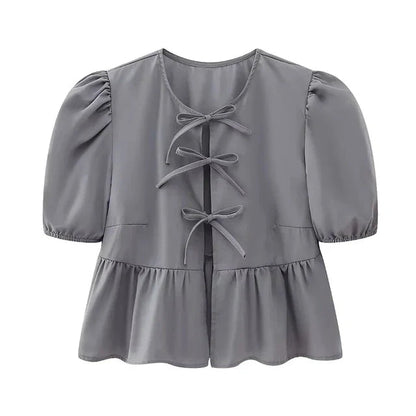 Blouse à manches bouffantes imprimé léopard avec détail nœud