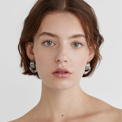 Élodie Lavin® | Boucles d’oreilles anneaux entrelacés en métal poli