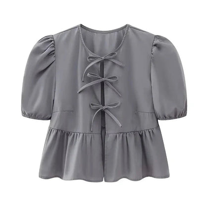 Blouse à manches bouffantes imprimé léopard avec détail nœud