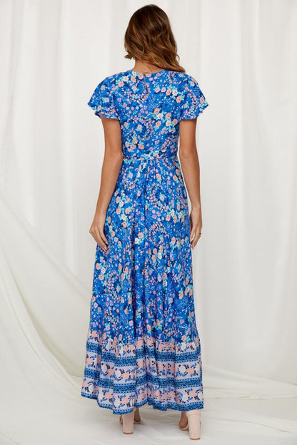 Pauline Laurent® | Robe maxi imprimée avec volants et effet cache-cœur