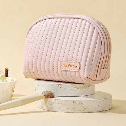 Trousse de maquillage en cuir matelassé
