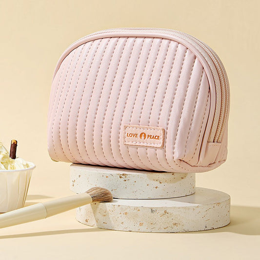 Trousse de maquillage en cuir matelassé