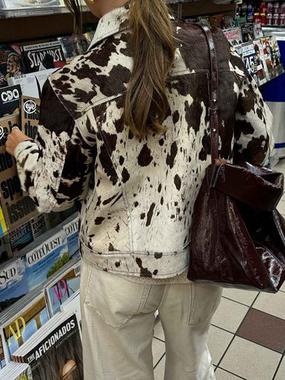 Veste à col cranté imprimé vache avec boutons pression stylés