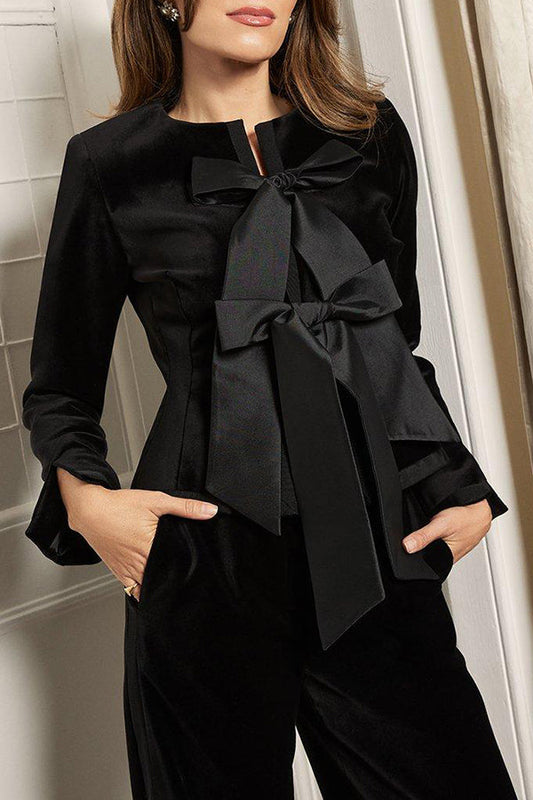 Veste péplum en taffetas sur mesure avec nœud en velours