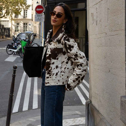Veste à col cranté imprimé vache avec boutons pression stylés