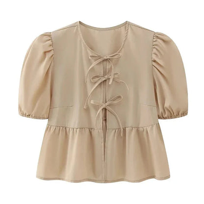 Blouse à manches bouffantes imprimé léopard avec détail nœud