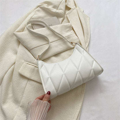 Sac baguette en cuir matelassé