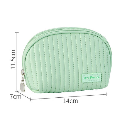 Trousse de maquillage en cuir matelassé