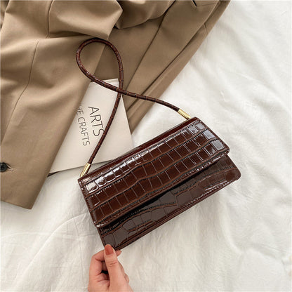 Sac baguette en cuir texturé