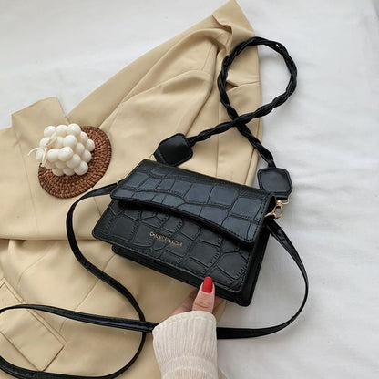 Sac à bandoulière en cuir texturé à anse tressée