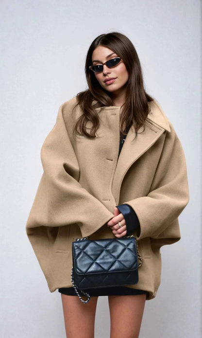 Manteau d'hiver oversize pour femmes avec col à revers et boutons asymétriques
