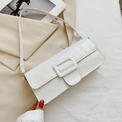 Sac baguette en cuir texturé brillant