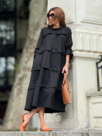 Robe noire élégante sans manches pour un look chic intemporel