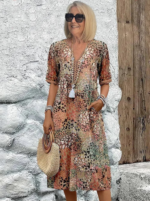 Helen | Élégante robe maxi à imprimé floral ludique