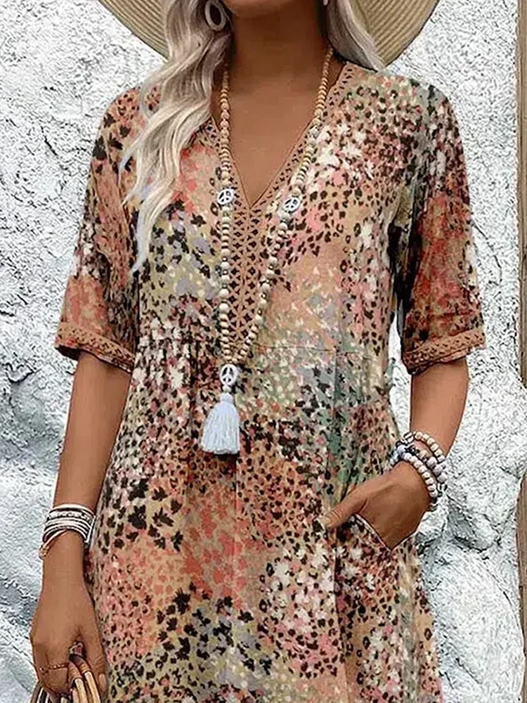 Helen | Élégante robe maxi à imprimé floral ludique