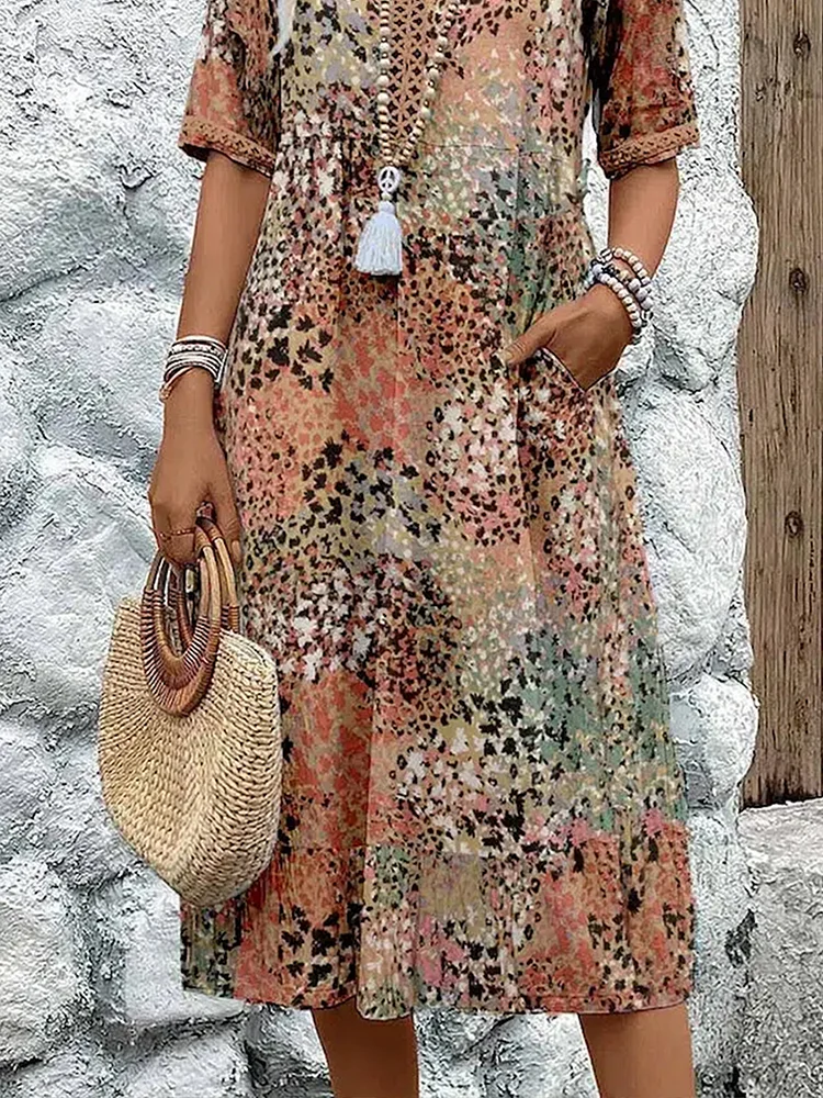Helen | Élégante robe maxi à imprimé floral ludique