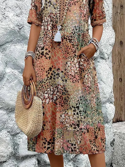 Helen | Élégante robe maxi à imprimé floral ludique