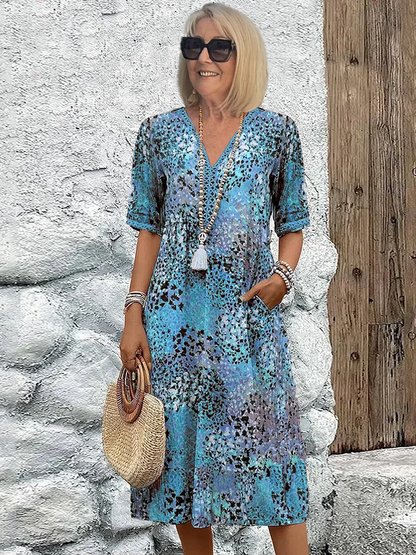 Helen | Élégante robe maxi à imprimé floral ludique