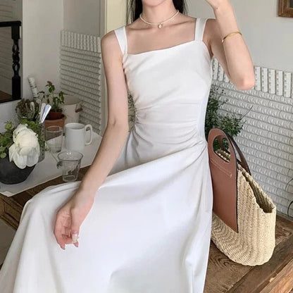 Pauline Laurent® | Robe midi blanche à encolure carrée