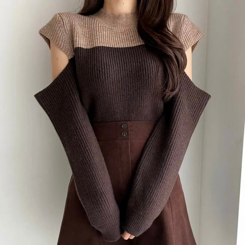 Pull en tricot bicolore avec manches ajourées