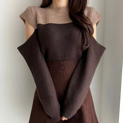 Pull en tricot bicolore avec manches ajourées