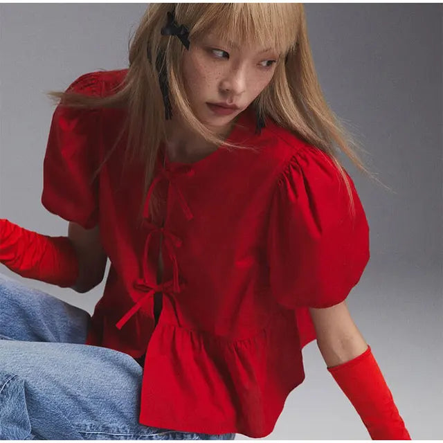 Blouse à manches bouffantes imprimé léopard avec détail nœud