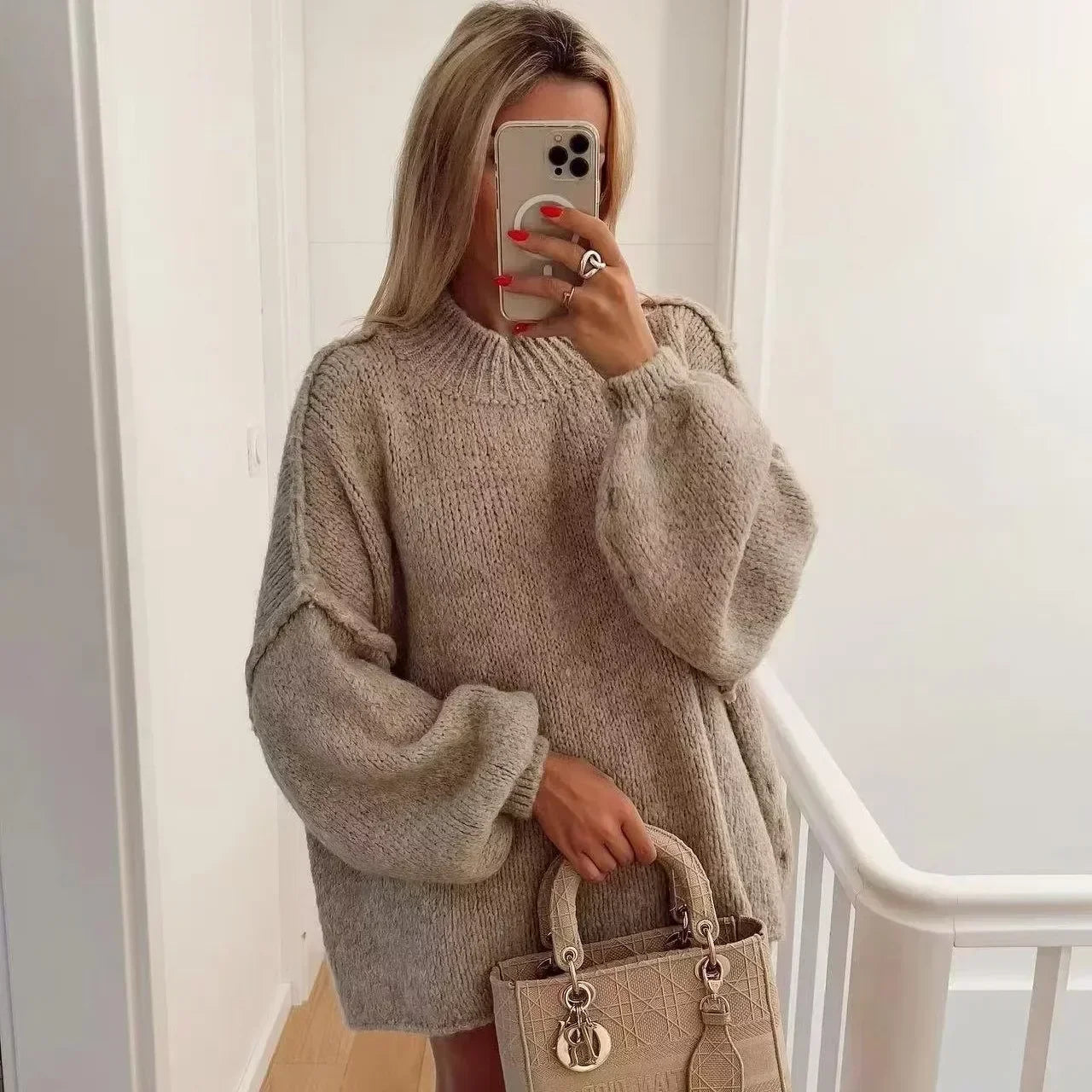 Pull à col roulé en maille douillette avec manches bouffantes tendance