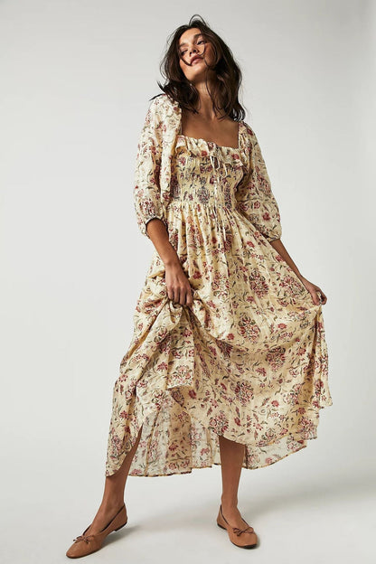 Pauline Laurent® | Robe midi imprimée avec haut froncé et volants