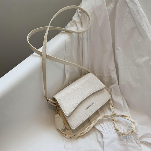 Sac à bandoulière en cuir texturé à anse tressée