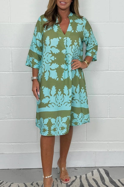 Robe Rayonnante En Col V
